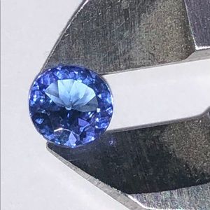 Offers. Not treated. 5.0 mm genuine Tanzanite.